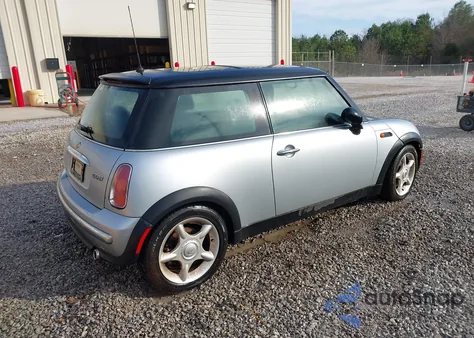 2003 Mini Cooper z USA, uszkodzony, nr VIN WMWRC33433TC47448